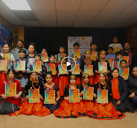 Dancer holding their certificates