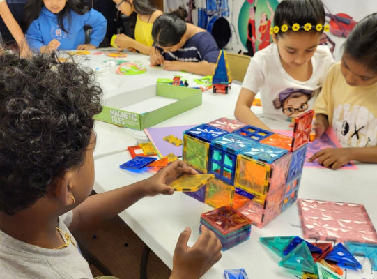 group of kids playing toys