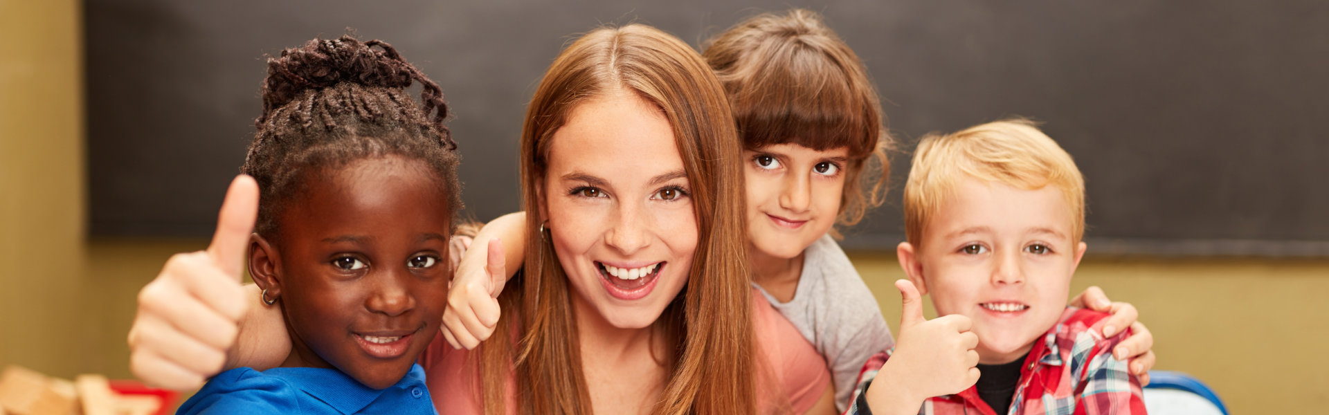 Happy teacher and students